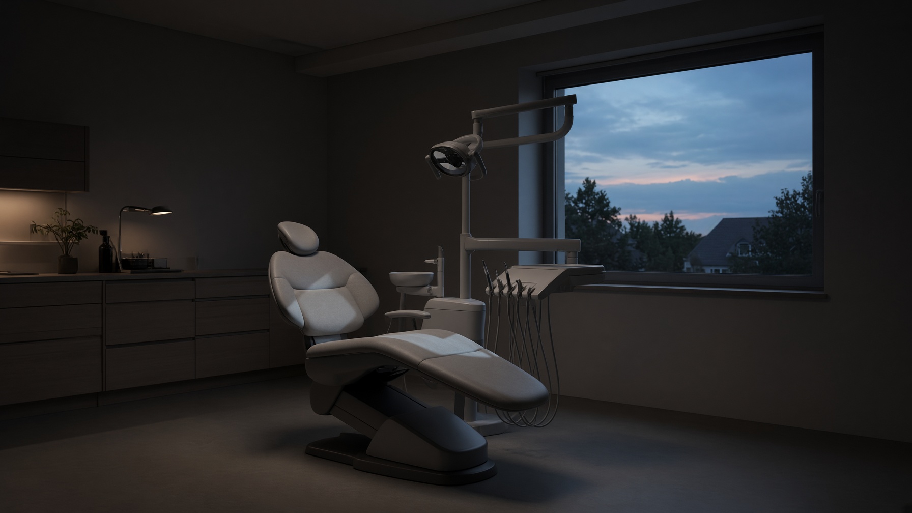 An empty dental chair in late light